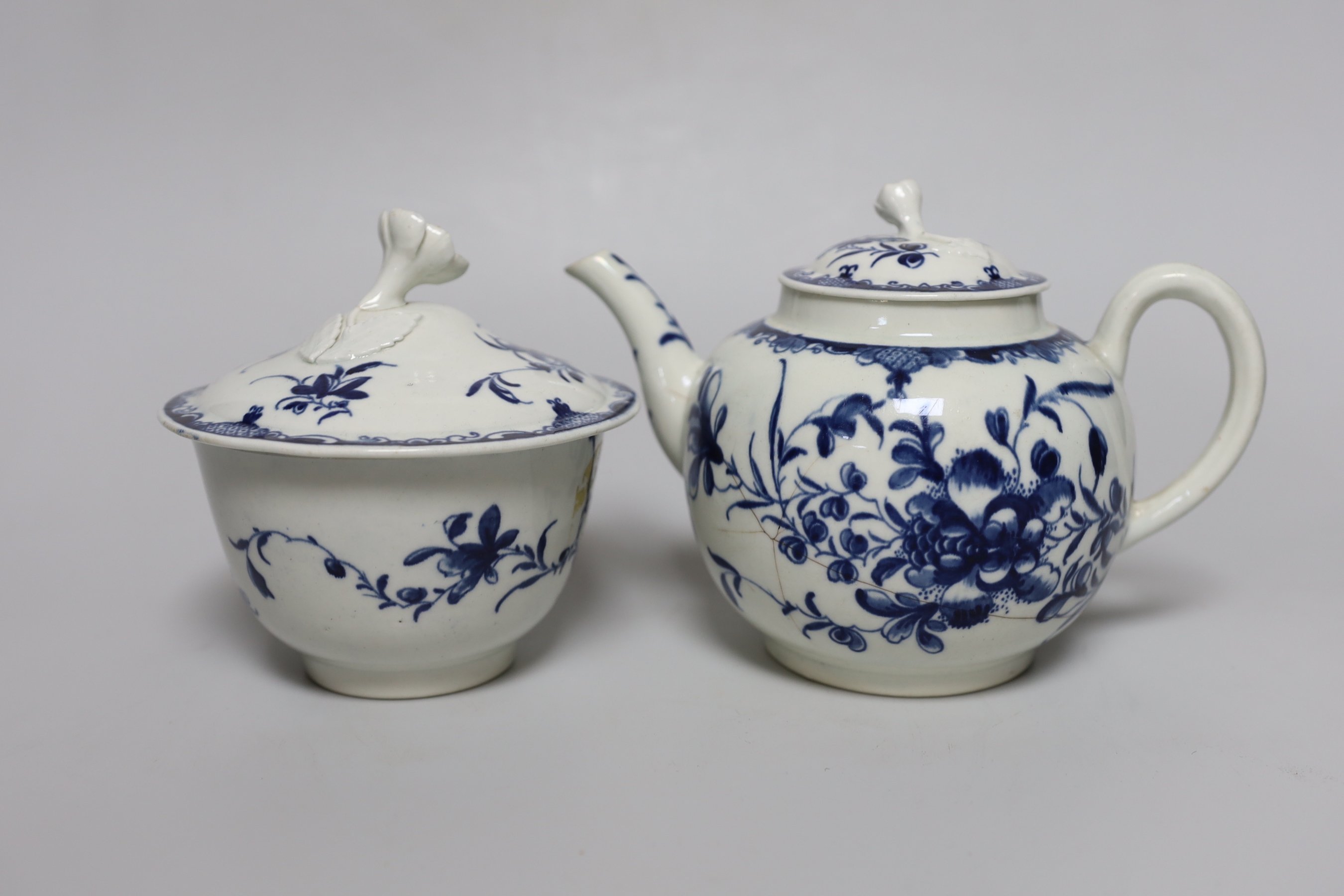 An early Worcester sucrier and cover painted with the Mansfield pattern, and a teapot and cover in the same pattern, c.1760, tallest 13cm